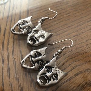 Silver masquerade earrings